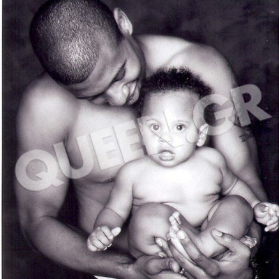 LOVE IS ... THE WAY A LOVING FATHER HOLDS WITH WORMTH HIS PRECIOUS SON