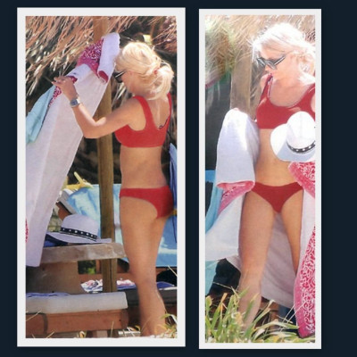 Ελένη Μενεγάκη: Οι ξέγνοιαστες στιγμές στην παραλία και το κόκκινο μαγιό (photos)