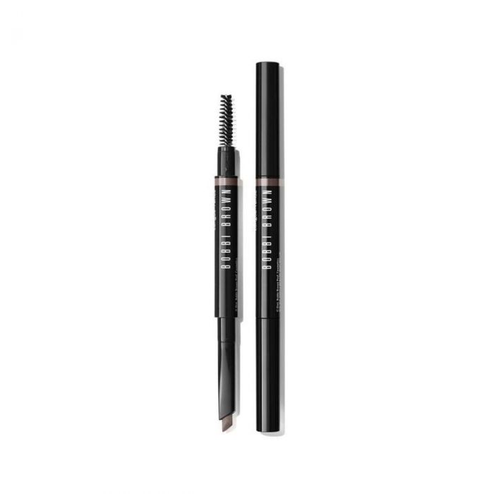 BOBBI BROWN, PERFECTLY DEFINED LONG WEAR BROW PENCIL: Μολύβι φρυδιών μεγάλης διάρκειας. Σου επιτρέπει να γεμίσεις τα σημεία που είναι πιο αραιά με τη βοήθεια της επίπεδης άκρης που διαθέτει και… όχι μόνο. Το βουρτσάκι βοηθά να διαχέεται το χρώμα καθώς επί