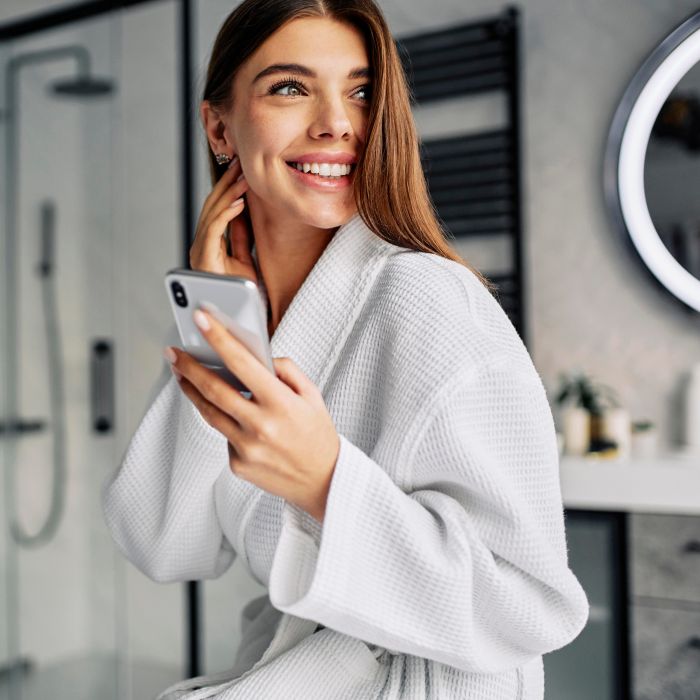 positive-young-woman-bathrobe.jpg