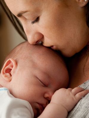 mcx-mom-holding-baby-mdn