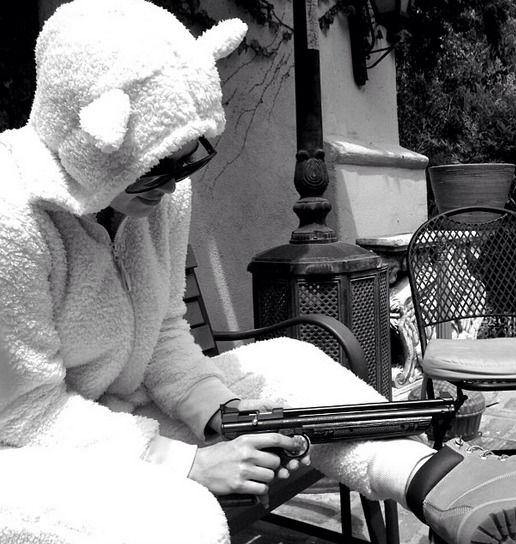 Khloe-Kardashian-Wears-Sheep-Costume-While-Holding-Gun-in-April-2014-1398651809