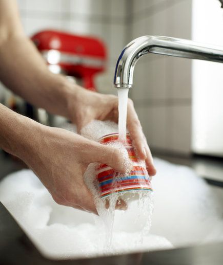 woman washing dishes f0ddc