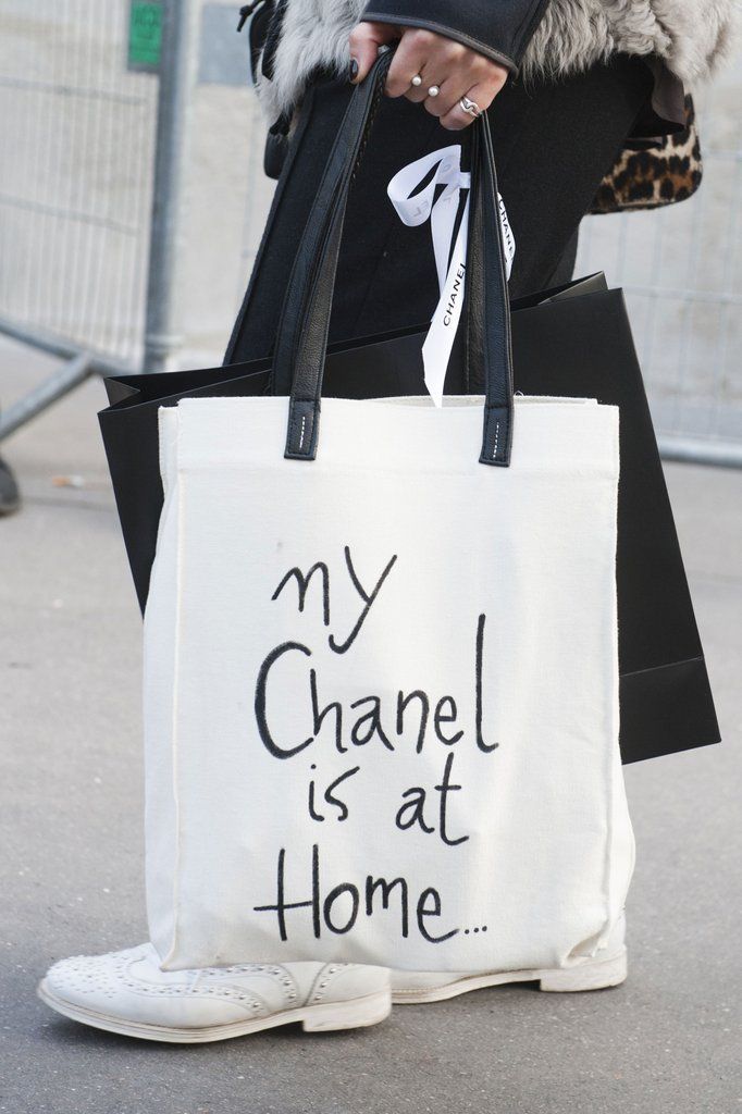 black white tote displayed cheeky chanel message