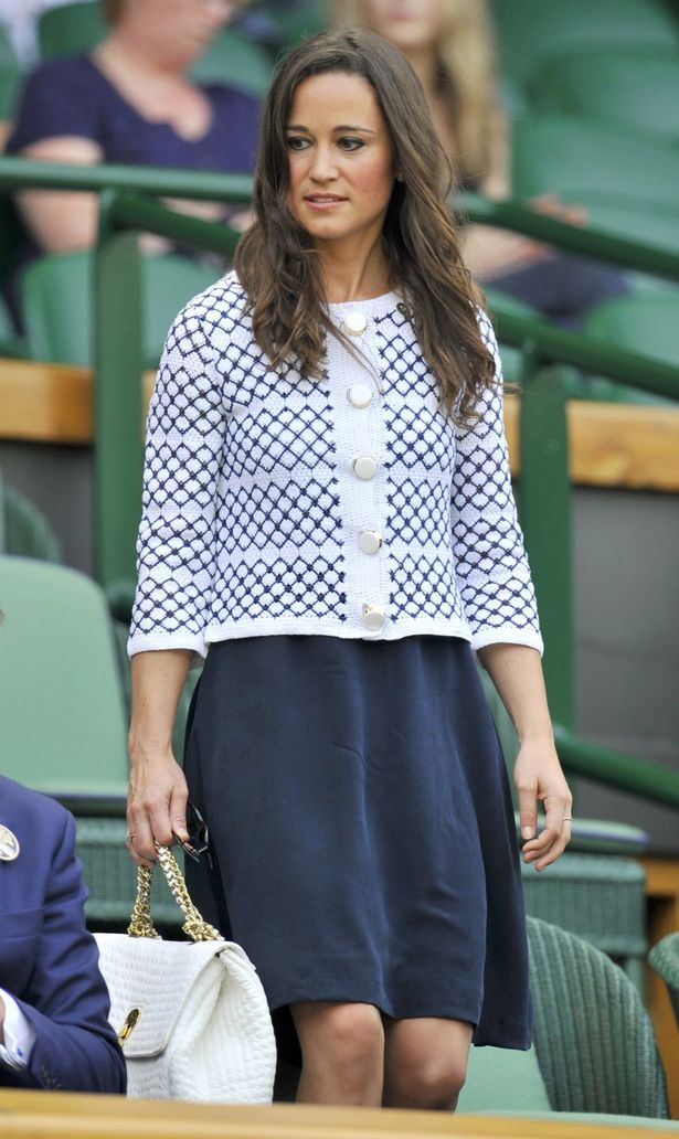 Pippa Middleton the sister of Catherine Duchess of Cambridge arrives on Centre Court before the womens singles tennis