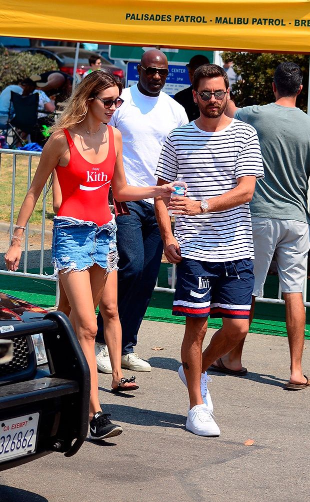 scott disick spotted with gorgeous mystery woman at same fair as kourtney kardashian younes awkward run in post