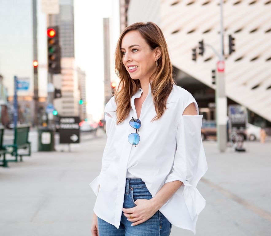 Sydne Style shows how to half tuck a button down shirt with jeans