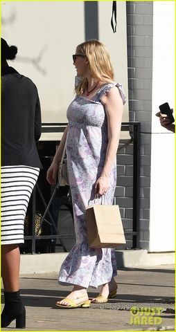 kirsten dunst covers up baby bump in purple maxi dress 12