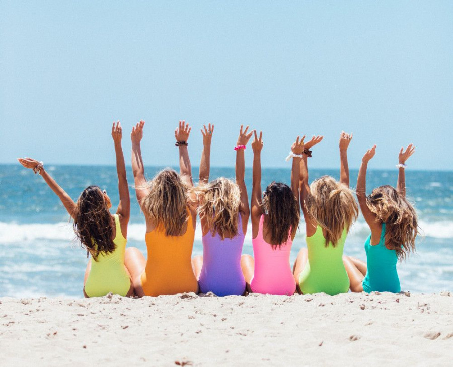 back view photo of six girls wearing swimsuit sitting on 2647973