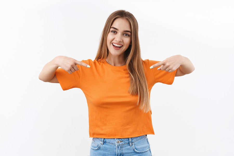 I am what you looking for. Confident stylish blonde girl, college student bragging, pointing fingers herself and smiling proud, show-off, boastful talking personal achievement, white background