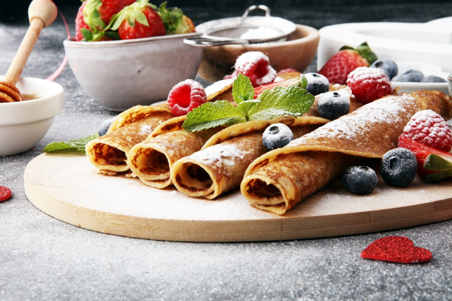 Delicious,Tasty,Homemade,Crepes,Or,Pancakes,With,Raspberries,And,Blueberries.