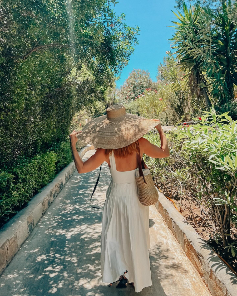Photo-by-maria-Iliaki-on-July-16-2024.-May-be-an-image-of-1-person-hat-sundress-parasol-and-outdoors..jpg