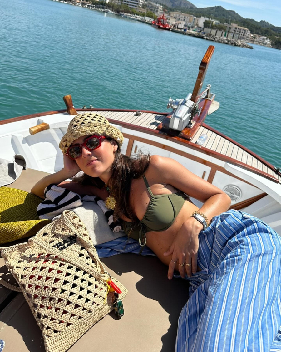 Photo-shared-by-Vicky-Montanari-on-May-29-2024-tagging-@prada.-May-be-an-image-of-sail-towel-boat-sarong-yacht-and-houseboat..jpg