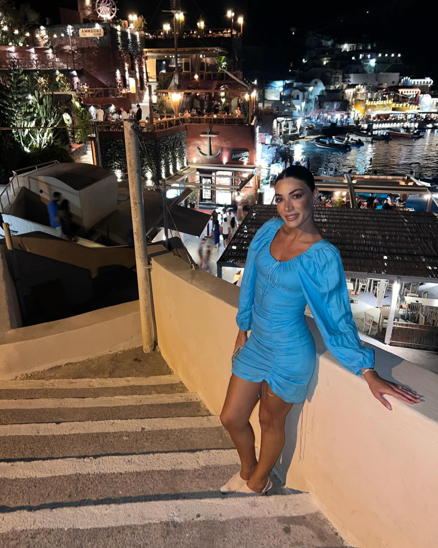 Photo-by-Ivi-Adamou-on-August-05-2024.-May-be-an-image-of-2-people-dress-and-Santorini..jpg