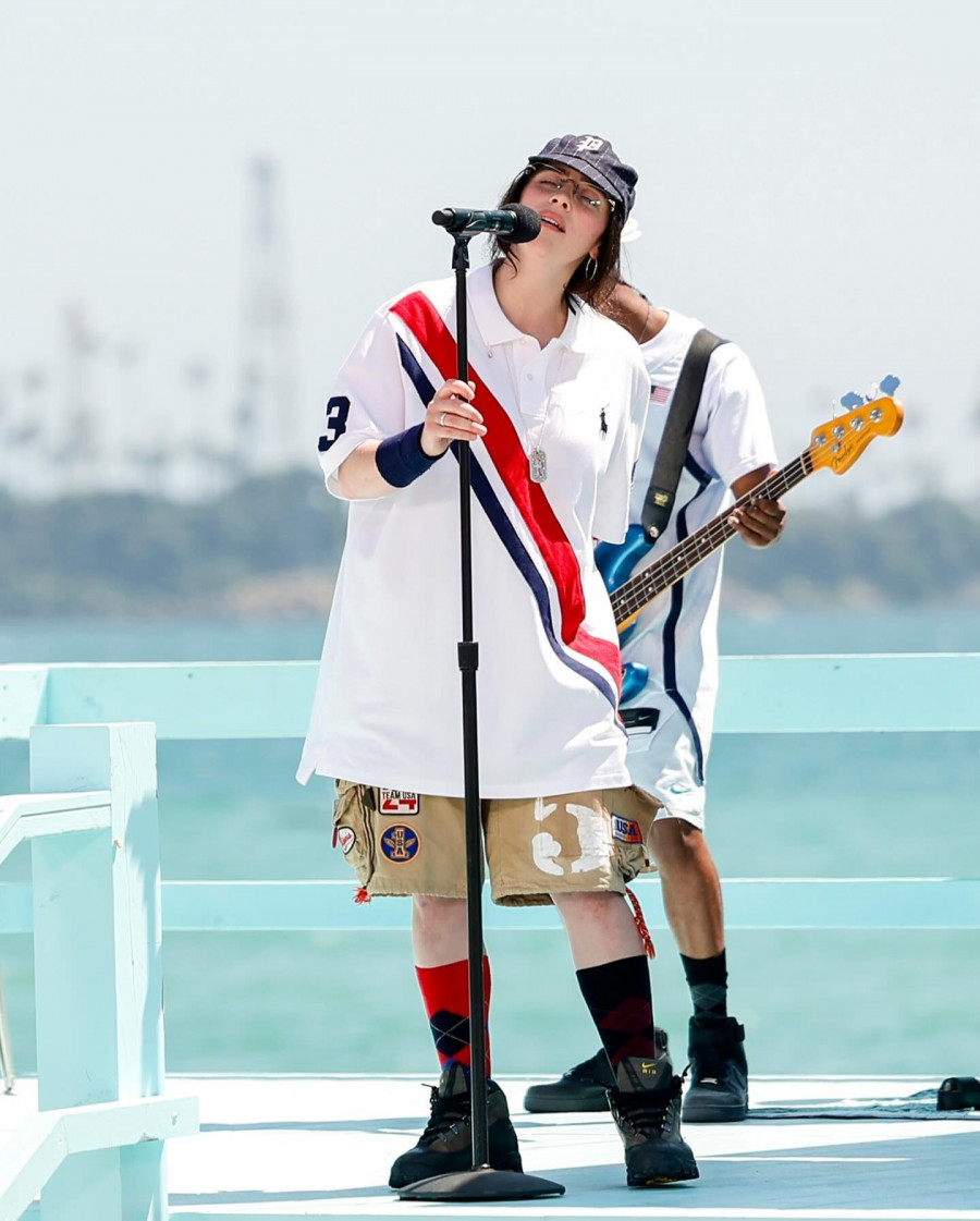 Photo-shared-by-Polo-Ralph-Lauren-on-August-11-2024-tagging-@billieeilish.-May-be-an-image-of-1-person-sweat-band-kilt-tambourine-and-text..jpg
