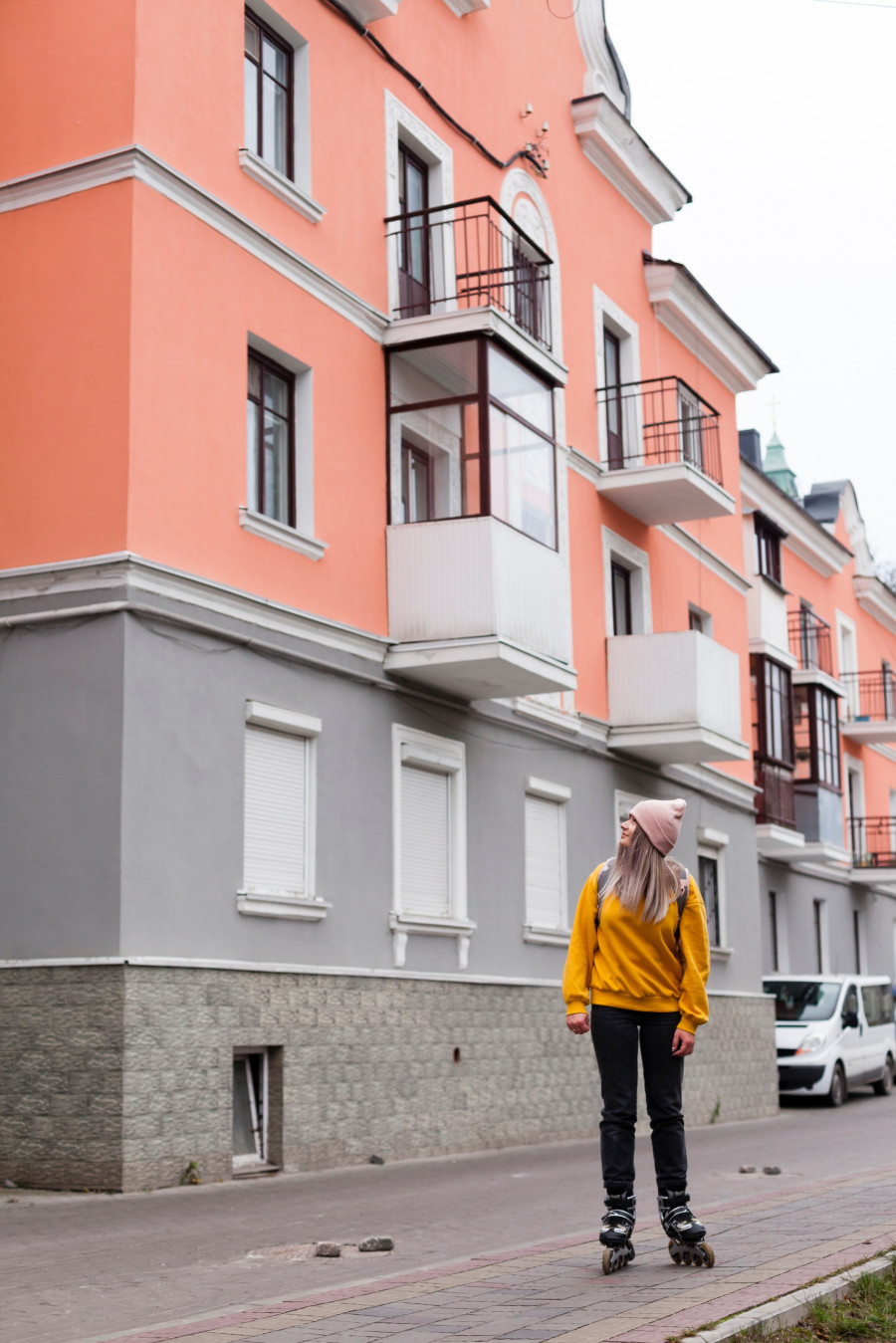 woman-posing-roller-blades-buildings.jpg