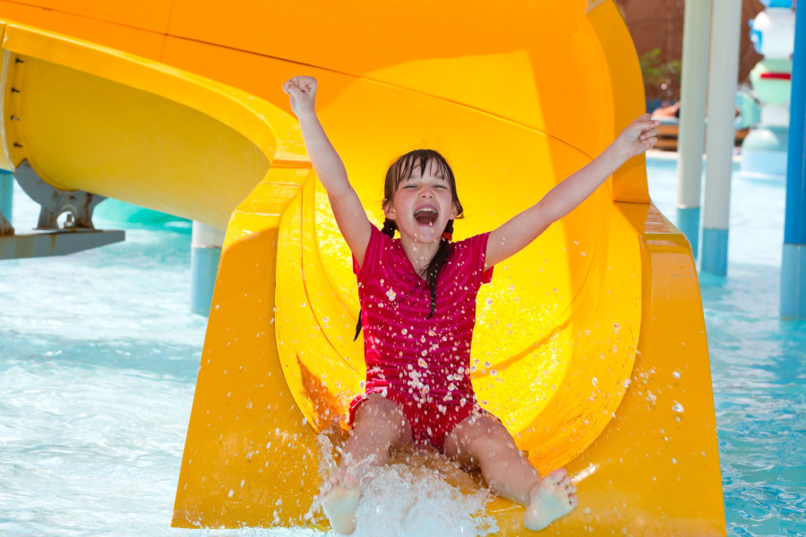 Happy,Girl,On,Waterslide